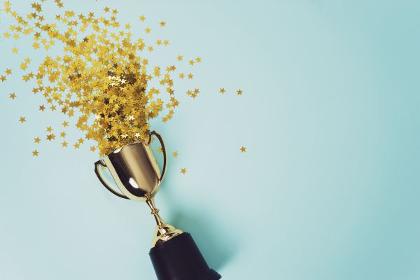 Confetti exploding from a trophy
