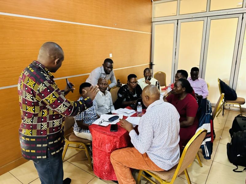 A small group during the multistakeholder workshop where rehabilitation professionals and representatives from health care facilities and the Ugandan Ministry of Health selected all 15 WHO Rehabilitation Module indicators to be integrated into the national HMIS