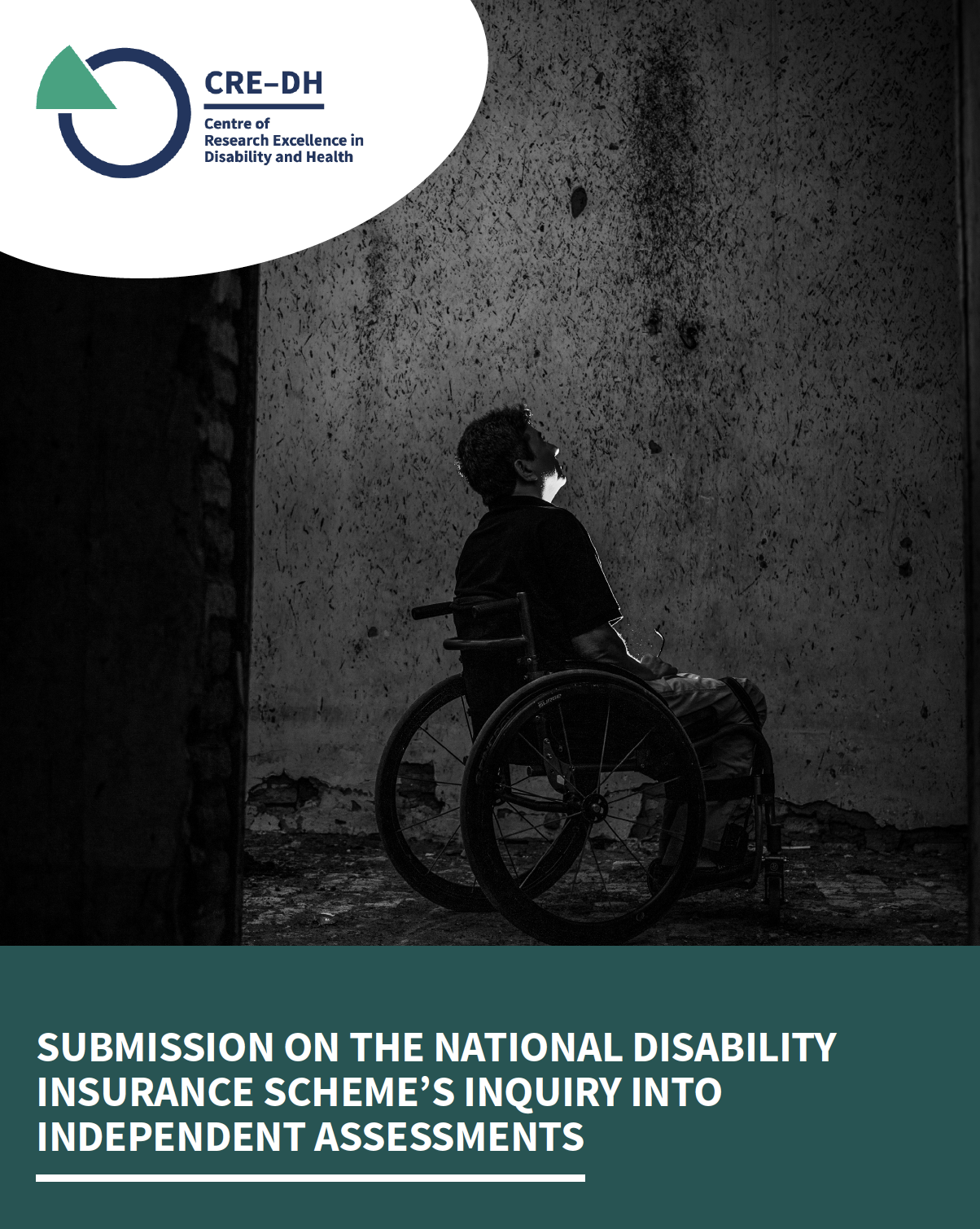 Front page of Submission shows a man in a wheelchair facing a wall, side profile in black and white