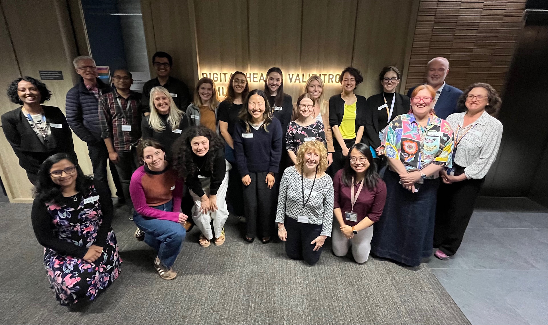 A group of workshop participants standing in a group at Melbourne Connect