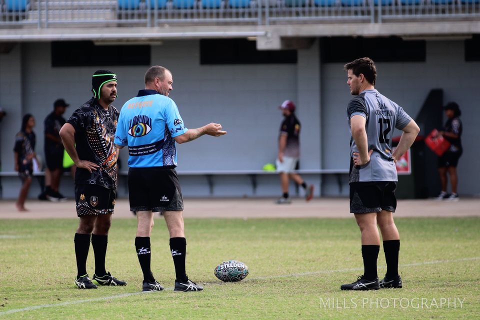 deadly cup carnival - umpire with players