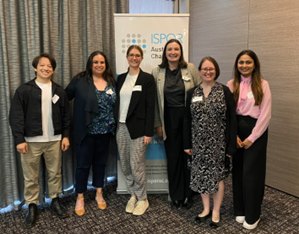 Photo from the March 2024 student showcase event. This photo includes 6 of the 7 student presenters. From left to right: Alex van Heusden, Nicole Reyes, Rachel O’Loughlin, Renee Jones, Elizabeth Walkley, and Diana Khana.