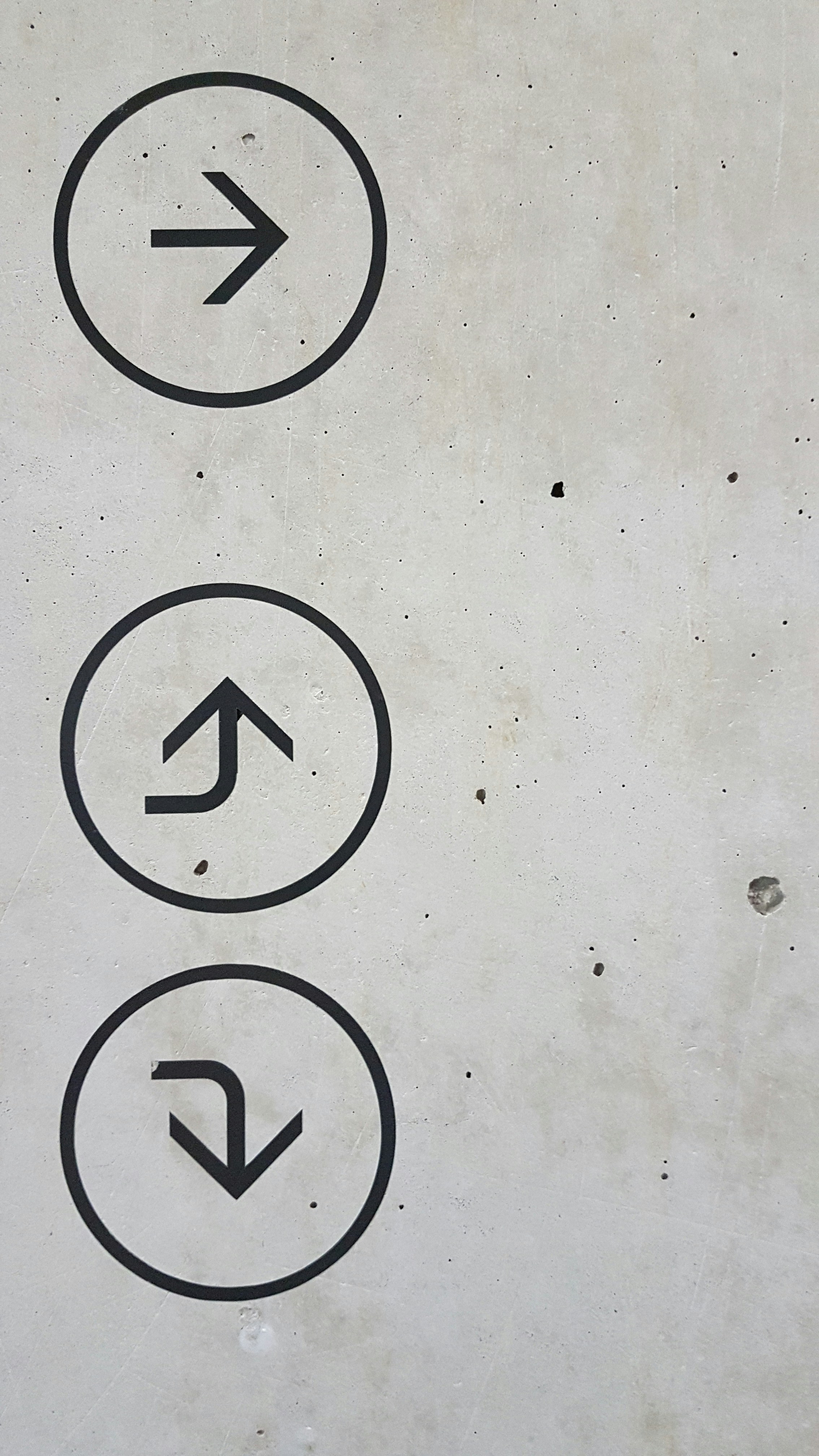 An image with one arrow pointing to the right, one arrow pointing up, and one pointing down
