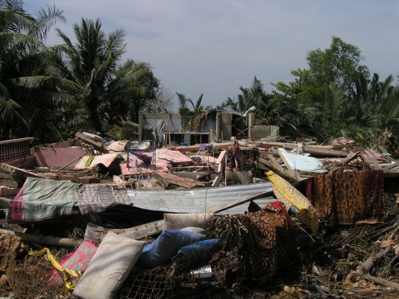 Many are left homeless after a natural disaster swept through this village. This picture depicts the rubble that was left behind.